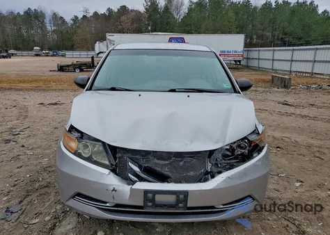 2015 Honda Odyssey Lx z USA, uszkodzony, nr VIN 5FNRL5H24FB093407